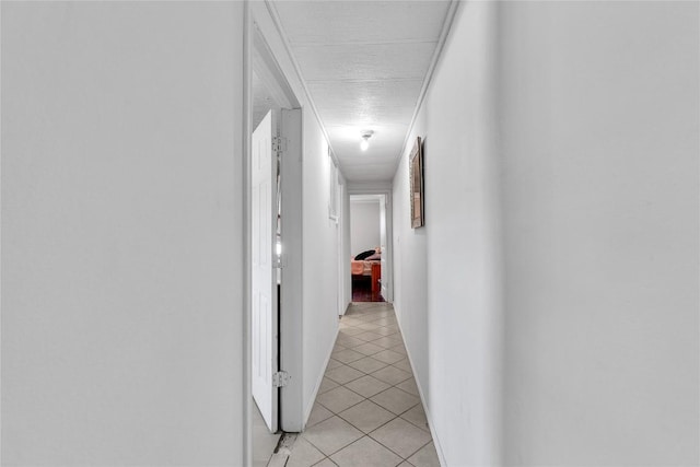 101 E Ash St, Granger, TX 76530 - hallway with light tile patterned floors