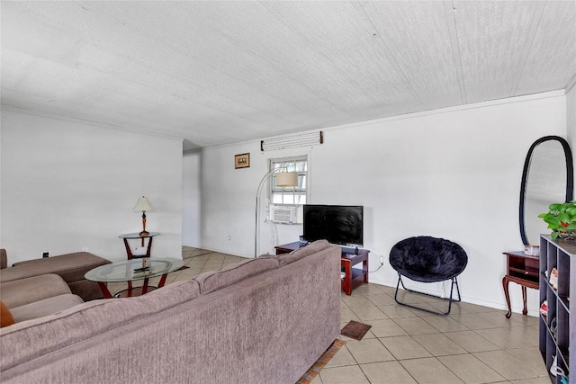 101 E Ash St, Granger, TX 76530 - living room featuring light tile patterned floors and crown molding