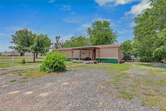 101 E Ash St, Granger, TX 76530 - rear view of house