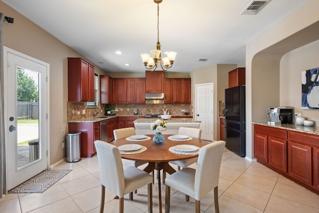 1012 Autumn Sage Way, Pflugerville, TX 78660 - dining space featuring a chandelier, light tile patterned flooring, and recessed lighting