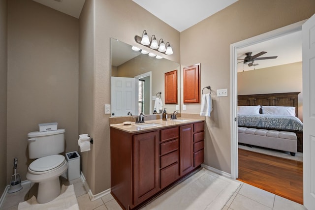 1012 Autumn Sage Way, Pflugerville, TX 78660 - ensuite bathroom featuring tile patterned floors, double vanity, and ceiling fan