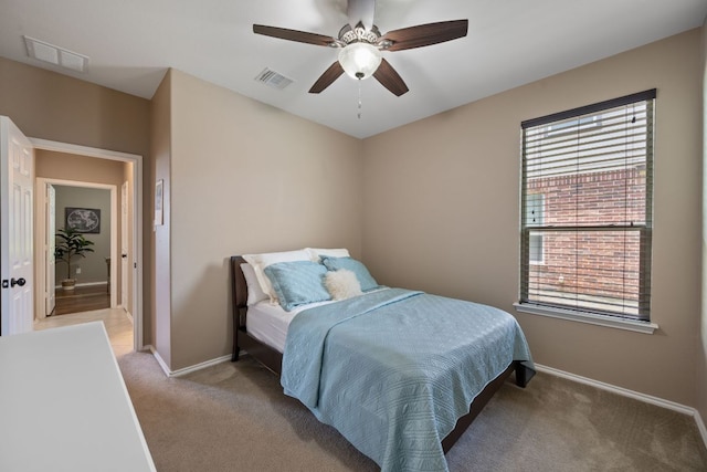 1012 Autumn Sage Way, Pflugerville, TX 78660 - bedroom featuring light colored carpet and ceiling fan