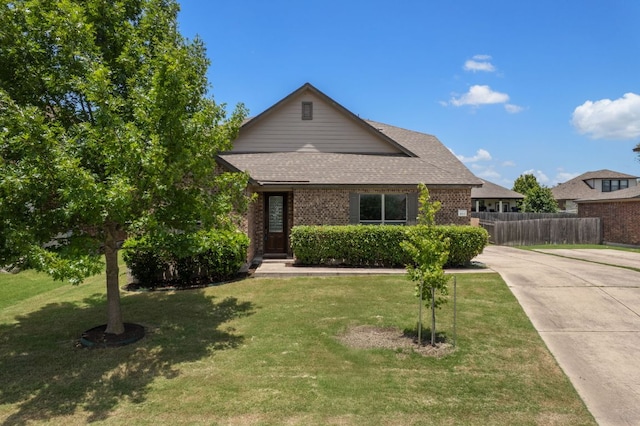 1012 Autumn Sage Way, Pflugerville, TX 78660 - view of front of property with brick siding, driveway, and a shingled roof