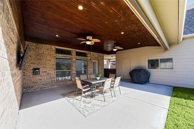 2502 Grey Kirby Dr, League City, TX 77573 - view of patio featuring a grill, outdoor dining area, and a ceiling fan