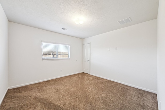 2502 Grey Kirby Dr, League City, TX 77573 - empty room featuring carpet and a textured ceiling