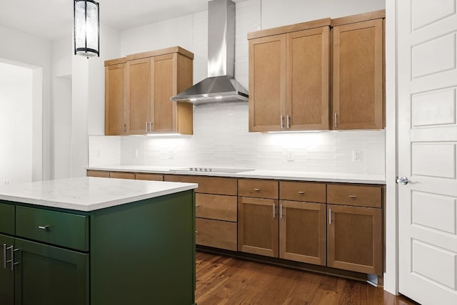 104 Huerta Rd, Florence, TX 76527 - kitchen with wall chimney range hood, black electric cooktop, tasteful backsplash, and dark wood finished floors