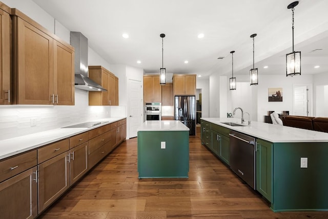 104 Huerta Rd, Florence, TX 76527 - kitchen with wall chimney exhaust hood, a large island, appliances with stainless steel finishes, tasteful backsplash, and recessed lighting