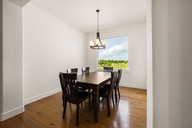 104 Huerta Rd, Florence, TX 76527 - dining room with a chandelier and hardwood / wood-style floors