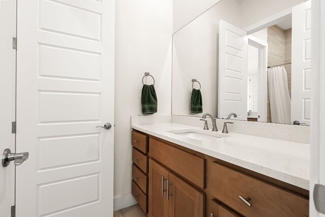 104 Huerta Rd, Florence, TX 76527 - bathroom featuring vanity and curtained shower