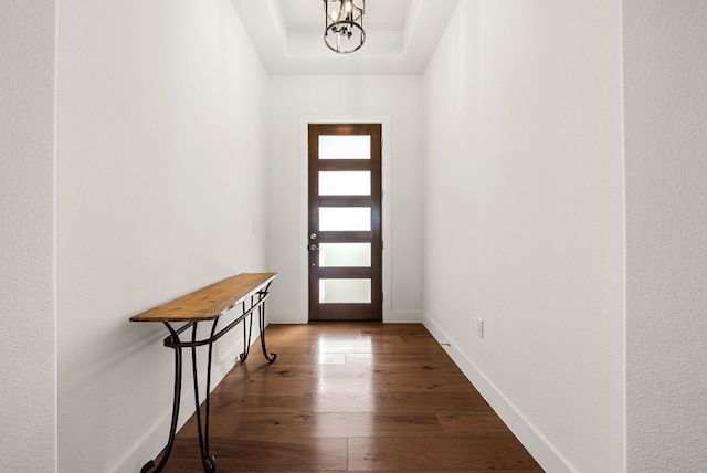 104 Huerta Rd, Florence, TX 76527 - doorway to outside featuring wood-type flooring and a chandelier