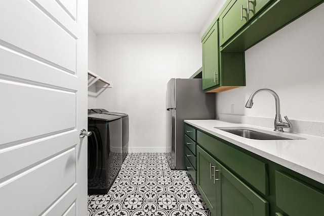 104 Huerta Rd, Florence, TX 76527 - laundry room featuring washer and clothes dryer and cabinet space