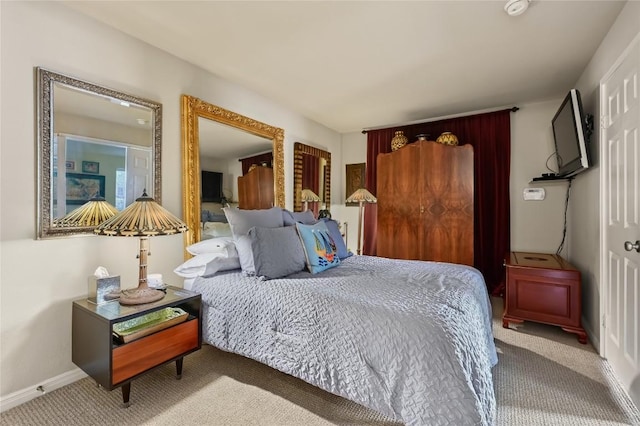 7685 Northcross Dr Unit 304, Austin, TX 78757 - carpeted bedroom featuring baseboards