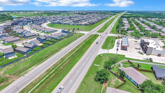 13124 Winecup Mallow Trl, Elgin, TX 78621 - aerial perspective of suburban area featuring a major roadway