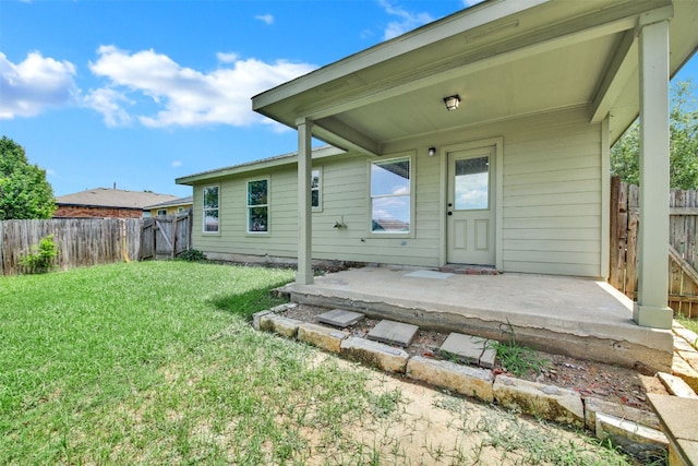 13124 Winecup Mallow Trl, Elgin, TX 78621 - rear view of house featuring a fenced backyard