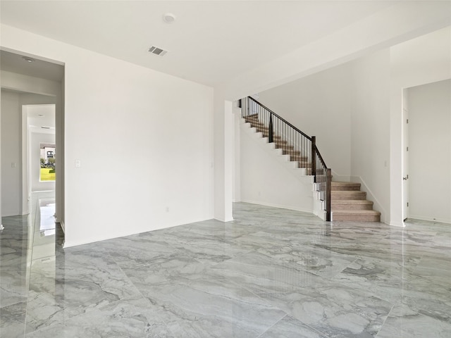 2308 Mondello Path, Leander, TX 78641 - unfurnished living room featuring marble tiled flooring and stairs