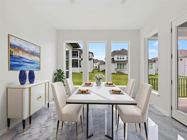 2308 Mondello Path, Leander, TX 78641 - dining space with light marble finish flooring and baseboards