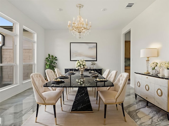 2308 Mondello Path, Leander, TX 78641 - dining room featuring light marble finish floors and a chandelier