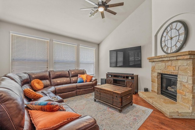 204 Archipelago Trl, Austin, TX 78717 - living room with ceiling fan, wood finished floors, a fireplace, and high vaulted ceiling