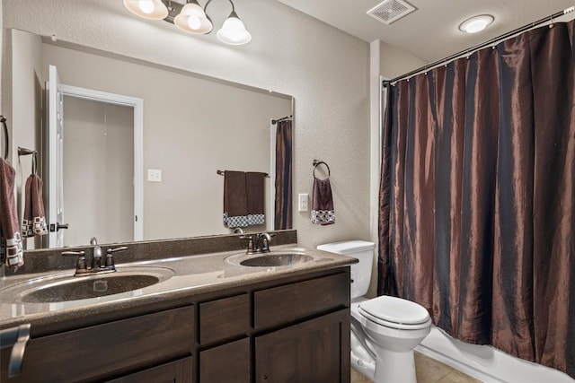 204 Archipelago Trl, Austin, TX 78717 - full bath with double vanity, tile patterned flooring, and a textured wall