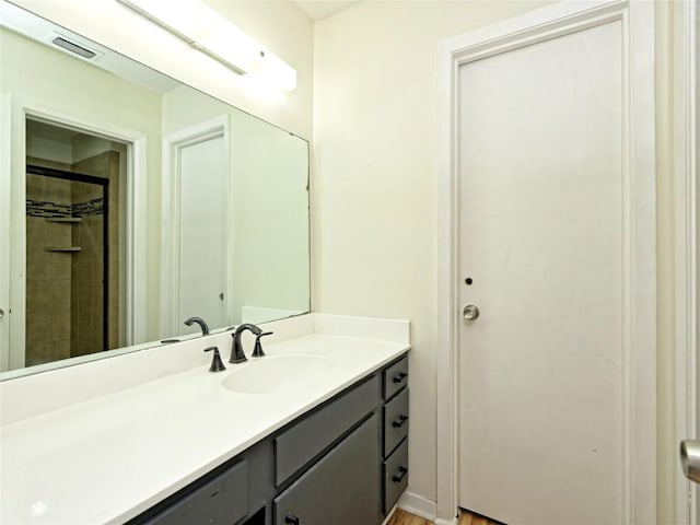 100 Lido Cir Unit A1, Lakeway, TX 78734 - bathroom with vanity and a tile shower