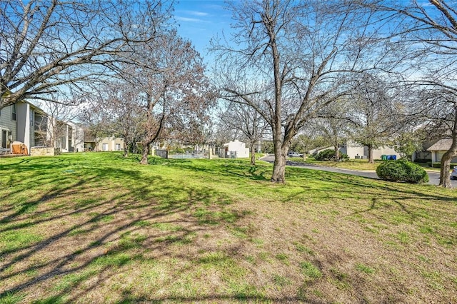 100 Lido Cir Unit A1, Lakeway, TX 78734 - view of grassy yard featuring a residential view
