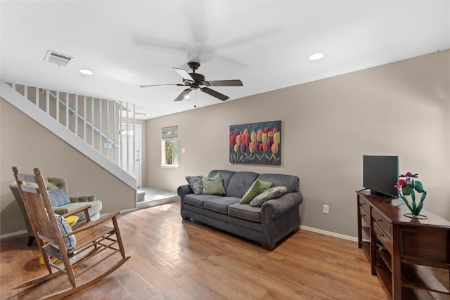 1021 Solano Dr Unit 1054A, Austin, TX 78750 - living room featuring stairway, light wood-style floors, ceiling fan, and recessed lighting