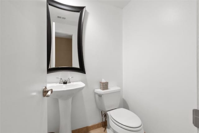1021 Solano Dr Unit 1054A, Austin, TX 78750 - bathroom with toilet and tile patterned flooring