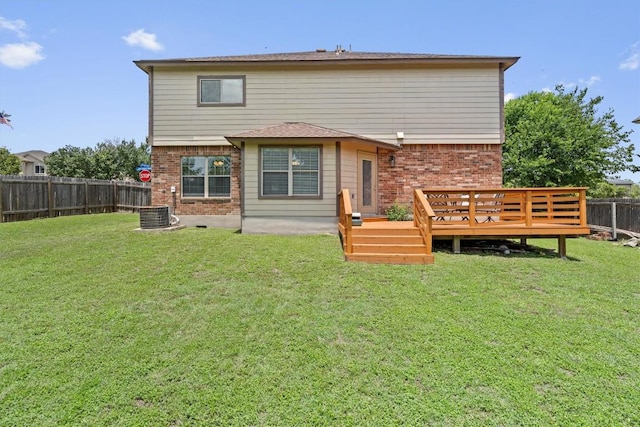 509 Red Tailed Hawk Dr, Pflugerville, TX 78660 - rear view of property with brick siding, a fenced backyard, and a deck