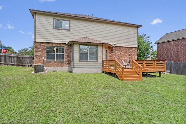 509 Red Tailed Hawk Dr, Pflugerville, TX 78660 - rear view of property featuring brick siding, a fenced backyard, and a deck