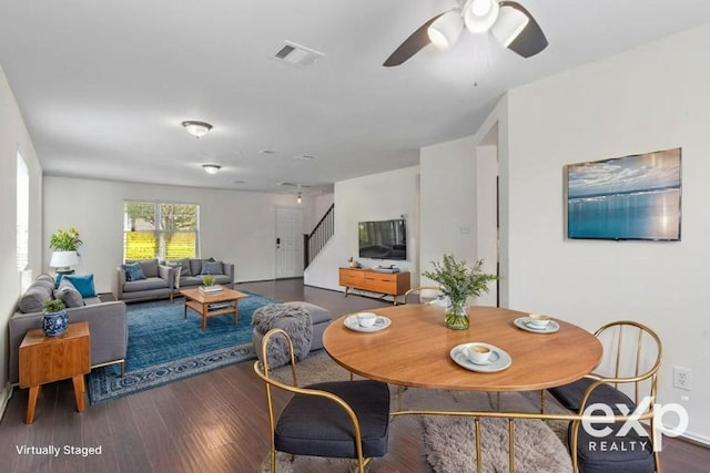 509 Red Tailed Hawk Dr, Pflugerville, TX 78660 - dining room with stairs, wood finished floors, and a ceiling fan