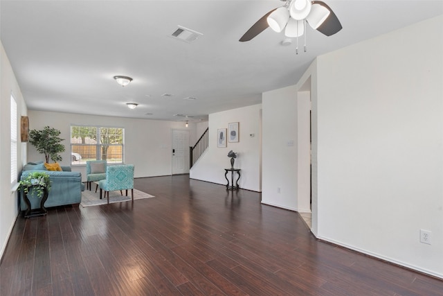 509 Red Tailed Hawk Dr, Pflugerville, TX 78660 - living area with stairway, ceiling fan, and wood finished floors