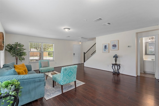 509 Red Tailed Hawk Dr, Pflugerville, TX 78660 - living room featuring stairs and wood finished floors