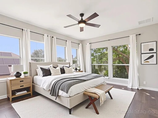 152 Acapulco Dr, Lakeway, TX 78734 - bedroom with wood finished floors and a ceiling fan