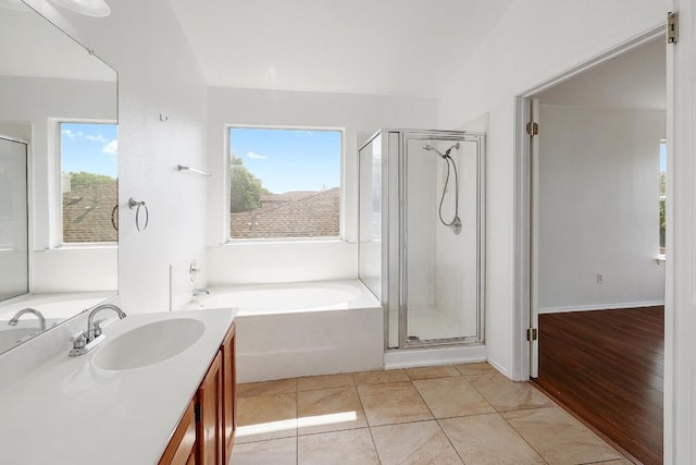 1505 Thibodeaux Dr, Round Rock, TX 78664 - bathroom featuring vanity, a garden tub, a stall shower, and healthy amount of natural light