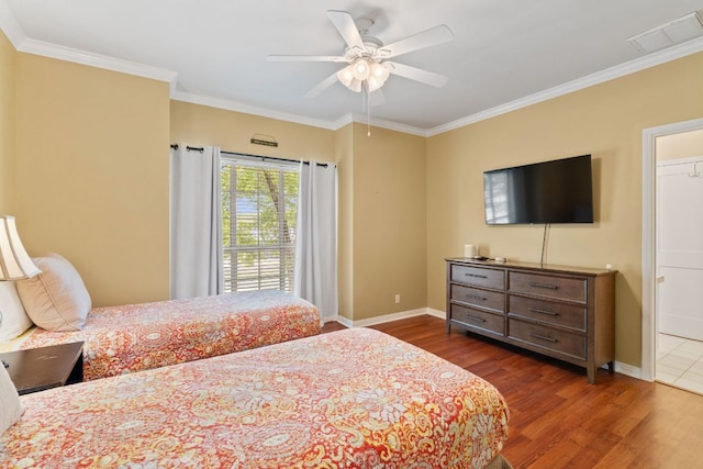 1005 Terry Ln, Kingsland, TX 78639 - bedroom featuring wood finished floors, ornamental molding, and ceiling fan