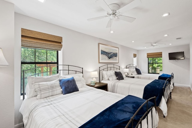 1005 Terry Ln, Kingsland, TX 78639 - bedroom featuring light colored carpet, recessed lighting, and a ceiling fan