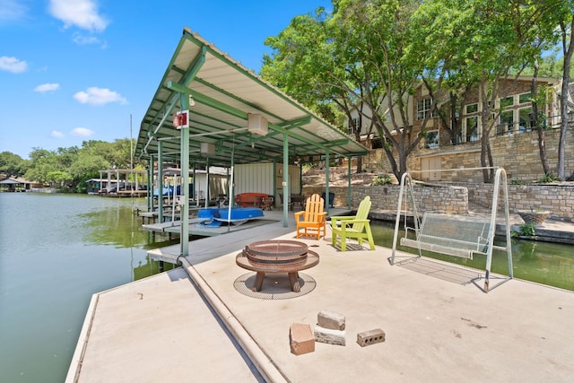 1005 Terry Ln, Kingsland, TX 78639 - dock with an outdoor fire pit and a water view