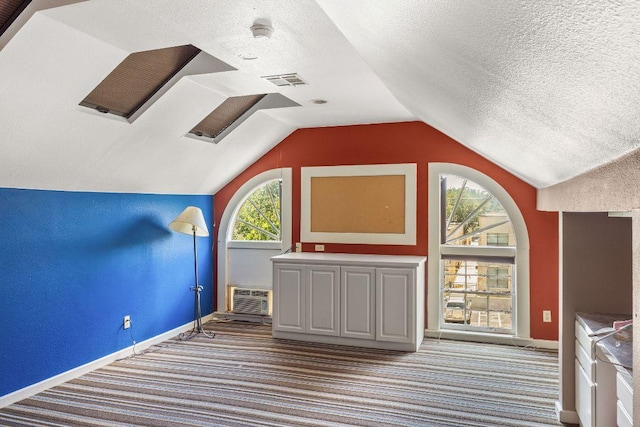 3201 W Ave, Austin, TX 78705 - bonus room with carpet, vaulted ceiling, a textured ceiling, and cooling unit