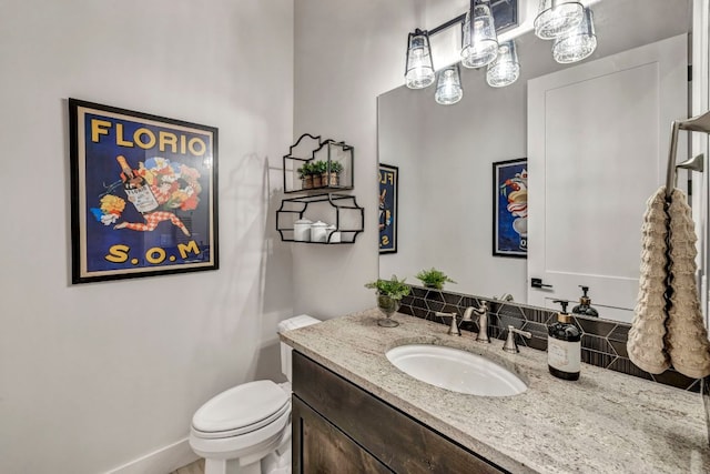 196 Westgate Loop, Horseshoe Bay, TX 78657 - half bathroom featuring vanity and toilet