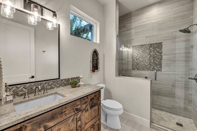 196 Westgate Loop, Horseshoe Bay, TX 78657 - full bathroom with vanity, a tile shower, and decorative backsplash
