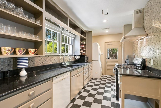 1410 Burford Pl, Austin, TX 78704 - kitchen with appliances with stainless steel finishes, exhaust hood, dark flooring, open shelves, and backsplash