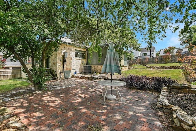1410 Burford Pl, Austin, TX 78704 - fenced backyard featuring a patio