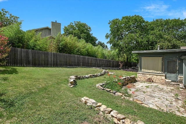 1410 Burford Pl, Austin, TX 78704 - fenced backyard with a patio