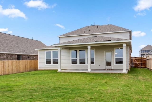 3715 Liberi Ln, Round Rock, TX 78665 - rear view of house with a patio area, a fenced backyard, and roof with shingles