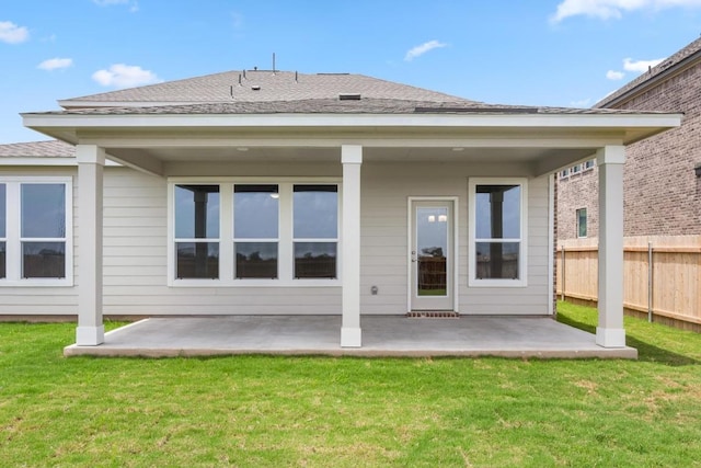 3715 Liberi Ln, Round Rock, TX 78665 - back of property with a patio area and roof with shingles