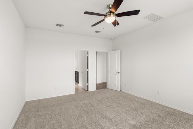 3715 Liberi Ln, Round Rock, TX 78665 - unfurnished bedroom featuring light carpet and a ceiling fan