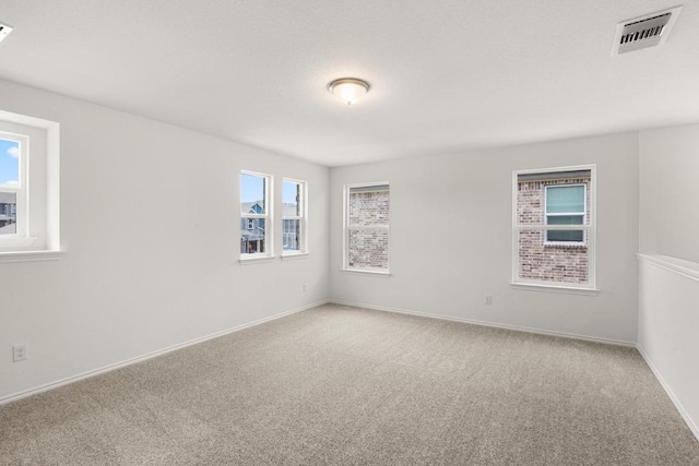3715 Liberi Ln, Round Rock, TX 78665 - carpeted empty room featuring baseboards