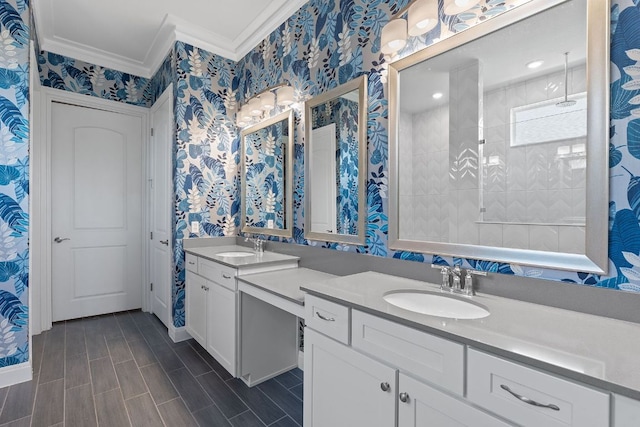 306 Iron Rail Ln, Georgetown, TX 78633 - full bathroom featuring ornamental molding, wallpapered walls, double vanity, and wood finished floors