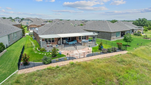 306 Iron Rail Ln, Georgetown, TX 78633 - rear view of property featuring outdoor lounge area, a fenced backyard, a patio area, and a residential view