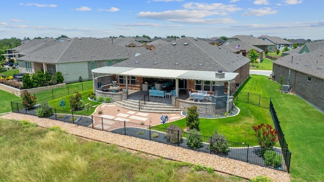 306 Iron Rail Ln, Georgetown, TX 78633 - rear view of property with a fenced backyard, a residential view, an outdoor living space, and a patio
